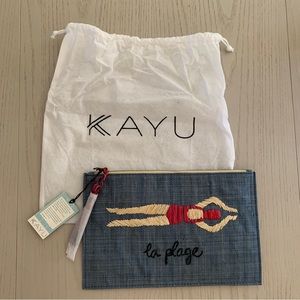 Handwoven straw clutch